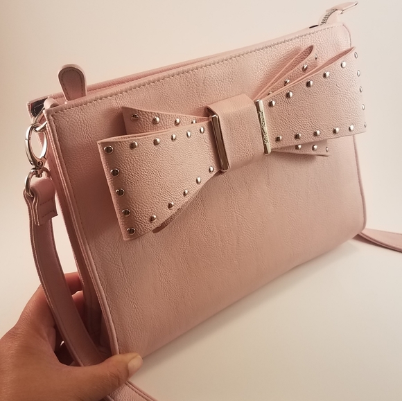Betsey Johnson Handbags - Betsy Johnson Pink Studded Bow Crossover Bag